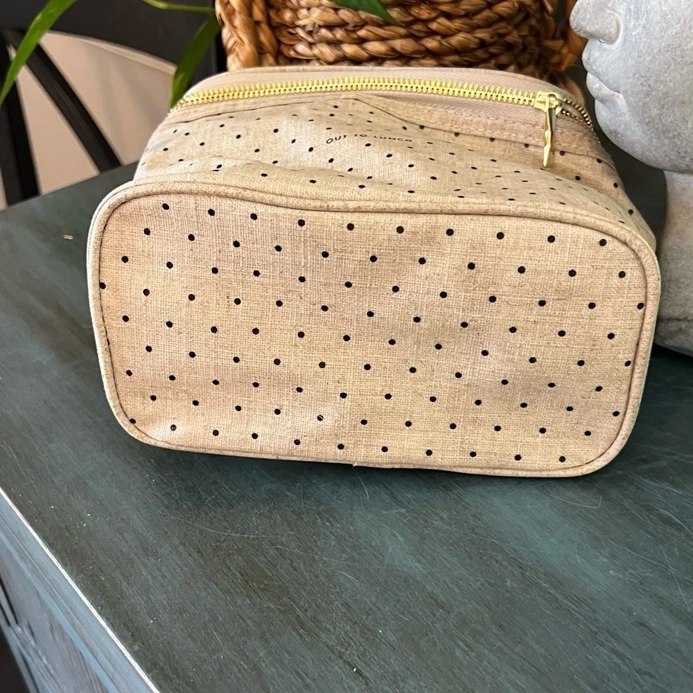 Kate Spade New York “Out to Lunch” insulated Lunch Tote with a Polka dot print.
